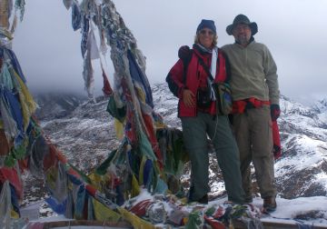 Frozen prayer flags & snowy views on Dzongri hill