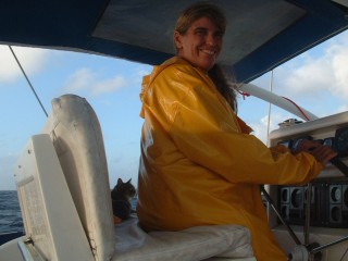 Sue and Arthur at the helm in a spray-filled cockpit