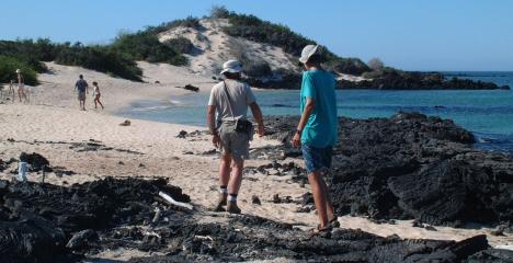 Tony, center, and Chris on the white sand beach at Sullivan Bay