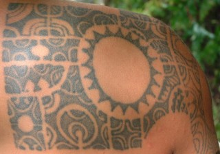 Our Marquesian friend shows off his elaborate shoulder tattoo