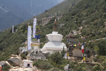 Chortins & prayer flags approaching the monastery