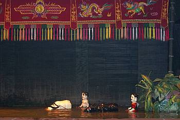 Water puppet show - puppeteers are behind screen