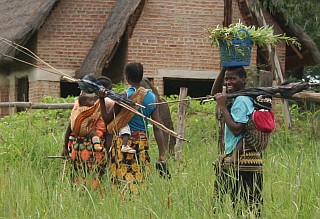 Three women, 3 children in from picking herbs