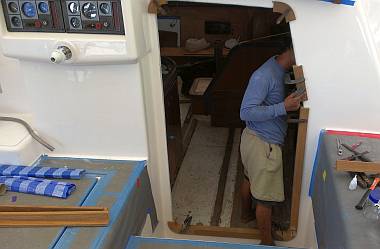 With the sliding door gone, Houa could work on teak door-frame